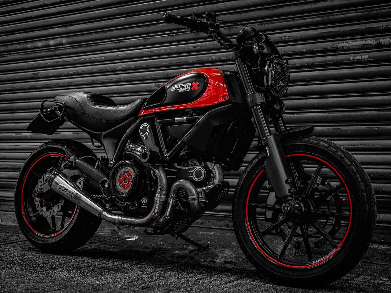 Stylish custom Ducati motorcycle parked in an urban setting in Ho Chi Minh City, Vietnam.